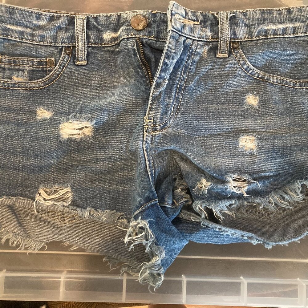 Free people distressed shorts. Size 25